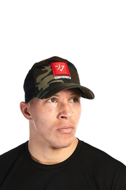 Man wearing unisex camouflage pattern cap with bold red Gambaru Fightwear logo on the front